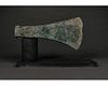 HEAVY BRONZE AGE BATTLE AXE ON STAND