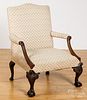 George III style carved mahogany open armchair.