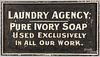 Painted Laundry Agency trade sign.