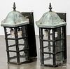 Pair of bronze architectural wall sconce lights.