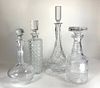Four Cut Glass Decanters with Stoppers