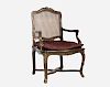A French Provincial Style Mahogany Armchair with Caned Seat, 20th Century.