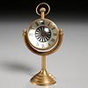 Antique brass and crystal sphere clock