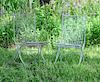 NEAR PAIR OF FRENCH PAINTED METAL GARDEN SLIPPER CHAIRS
