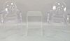 Three piece lot to include ghost style chairs along with lucite side table.