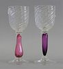 GLASS: Set of fourteen glass water goblets, colored stems, twist pattern to goblet, signed "EMR" to base, each: 10" h., light wear.