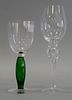 Two sets of stem wine glasses, twelve tall clear glass with bubble in stem, similar to Steuben, along with a set of eleven stem glasses with green ste