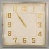 Cartier Art Deco alarm mantle clock, having silvered square frame with gold numbers and hands, face marked "Cartier 8 Days Swiss Eterna Brevet" on bac