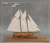 Two masted sailing ship model in plexiglass case, ht. 28", wd. 33 1/2".