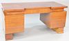 French art moderne desk, possibly Andre Sornay, c. 1940's, walnut, ht. 29 3/4", top 29 1/2" x 63".