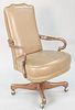Leather upholstered swivel executive chair, 42 1/2" h. x 26 1/2" w., Provenance: Former home of Mel Gibson, Old Mill Rd, Greenwich, CT.