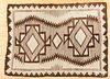 Two Navajo Indian rugs, 55" x 40" and 73" x 49".