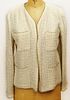 From a Palm Beach Socialite, A Retro Chanel Ivory Colored Boucle Jacket with Faux Pearl Accent Trim