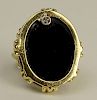 Lady's Vintage 14 Karat Yellow Gold and Black Onyx Ring with small accent Diamond