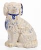 AMERICAN DECORATED STONEWARE SEATED SPANIEL