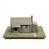 AMERICAN FOLK ART CARVED AND PAINTED CABIN MODEL