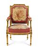 A Louis XVI Style Tapestry Upholstered Giltwood Fauteuil Height 38 3/4 inches.