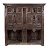 A Gothic Oak Sacristy Cabinet Height 77 1/2 x width 79 x depth 23 inches.