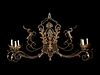 A Wrought Iron and Ta´le Six-Light Chandelier