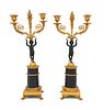 A Pair of Empire Gilt and Patinated Bronze Figural Candlesticks