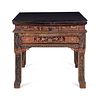 A Chinese Export Carved and Lacquered Game Table