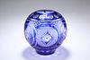 A LARGE BOHEMIAN BLUE OVERLAY GLASS VASE, ball-shaped, decorated with six c