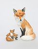 A ROYAL WORCESTER MODEL OF A SEATED FOX, no. 2993, 18.5cm; together with A 