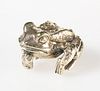 STUART DEVLIN
 A SILVER-GILT FROG, LONDON 1973, cast with finger on chin. 3