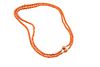 A DOUBLE-STRAND CORAL NECKLACE
 Composed of two graduated strands of 4.3mm 