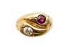 A RUBY AND DIAMOND SNAKE RING, CIRCA 1886
 Designed as a pair of entwined s