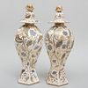 Pair of English Cream Ground Gilt Decorated Octagonal Vases and Covers