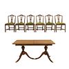 Comedor. Siglo XX. Estilo inglés. En talla de madera. Consta de: Mesa y 6 sillas. 77 x 158 x 107 cm.