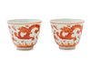 A Pair of Iron Red Decorated Porcelain 'Dragon' CupsHeight 2 x diam 2 1/2 in., 5.1 x 6.4 cm.