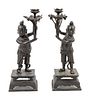 A Pair of Bronze 'Boy' Candle HoldersHeight 17 in., 43 cm.