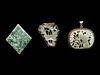 Three Jade and Jadeite Inset Gilt Metal Mounted Jewelry
Length of largest 2 in., 5.08 cm.