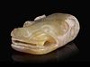 A White Jade Head of a Dragon
Length 1 3/4 in., 4.4 cm.