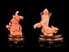 Two Carved Coral Snuff Bottles
Height of taller 2 in., 5 cm.