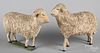 Two large carved and gessoed stick leg sheep