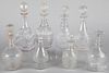 Eight colorless glass decanters, 19th c.