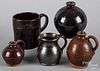 Two small redware ovoid jugs