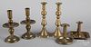 Six brass candlesticks