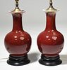 Pr of 20th C. Chinese porcelain oxblood vases converted to lamps