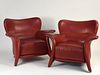 Pair of red leather lounge chairs by Maurice Villency