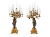A Pair of Large French Gilt and Patinated Bronze Fourteen-Light Candelabra Height overall 45 inches.