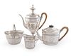 A George III Silver Four-Piece Tea and Coffee Service
Height of coffee pot 12 x length over handle 9 7/8 inches.