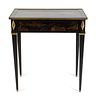 A French Empire Style Black Lacquer and Gilt Bronze Mounted Side Table
Height 28 x width 25 3/4 x depth 15 1/2 inches.