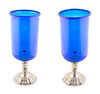 A Pair of Cobalt Glass and Silvered Metal Base Hurricane Lamps
Height 18 1/2 inches