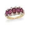 A RUBY AND DIAMOND FIVE-STONE RING 
 Centred by a 