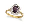 A PURPLE SAPPHIRE AND DIAMOND CLUSTER RING
 The ov