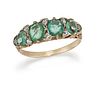 AN EMERALD AND DIAMOND RING
 Set with four oval-cu